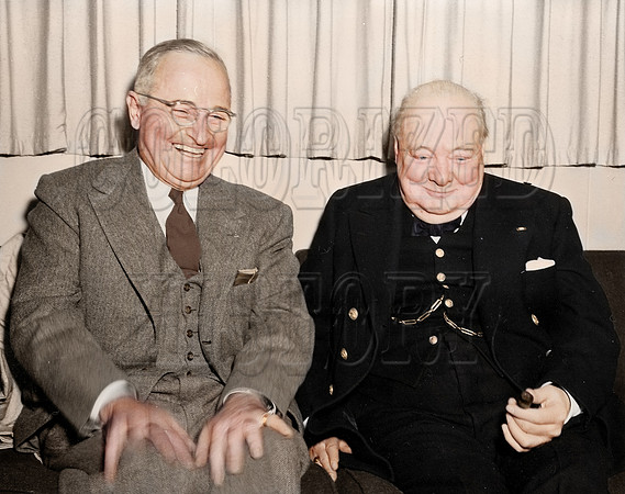 President Truman sharing a laugh with British Prime Minister Winston Churchill aboard the President's yacht, the U.S.S. WILLIAMSBURG, during Churchill's visit to the United States