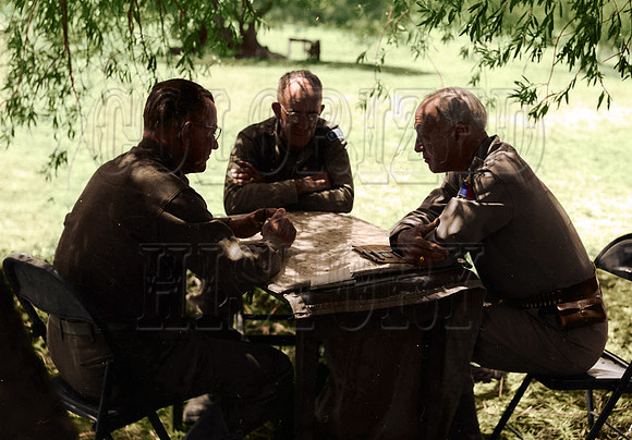 Left to right -  Major General Troy H. Middleton, commander of the 45th Division; Major General Omar N. Bradley; and Patton, in a Sicilian olive grove, July 25, 1943 - cropped.