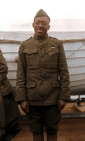 Sgt. Henry Johnson of the 369th poses wearing the Cross of War, awarded for bravery in an outnumbered battle against German force